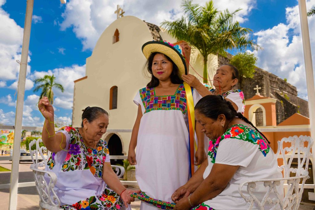 Maya women in embroidered hipiles in Felipe Carrillo Puerto