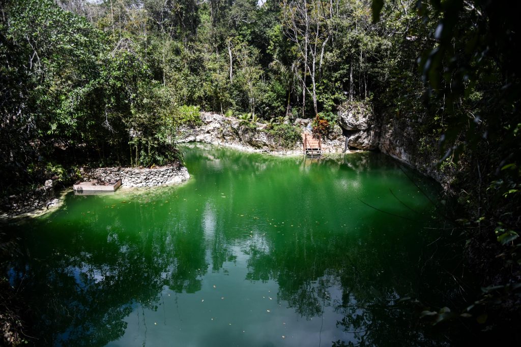 Open cenote with a jumping platform, Puerto Morelos