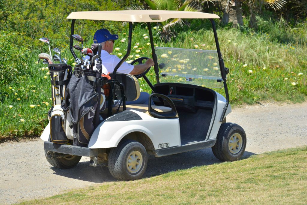 Golfer on a course in the Mexican Caribbean