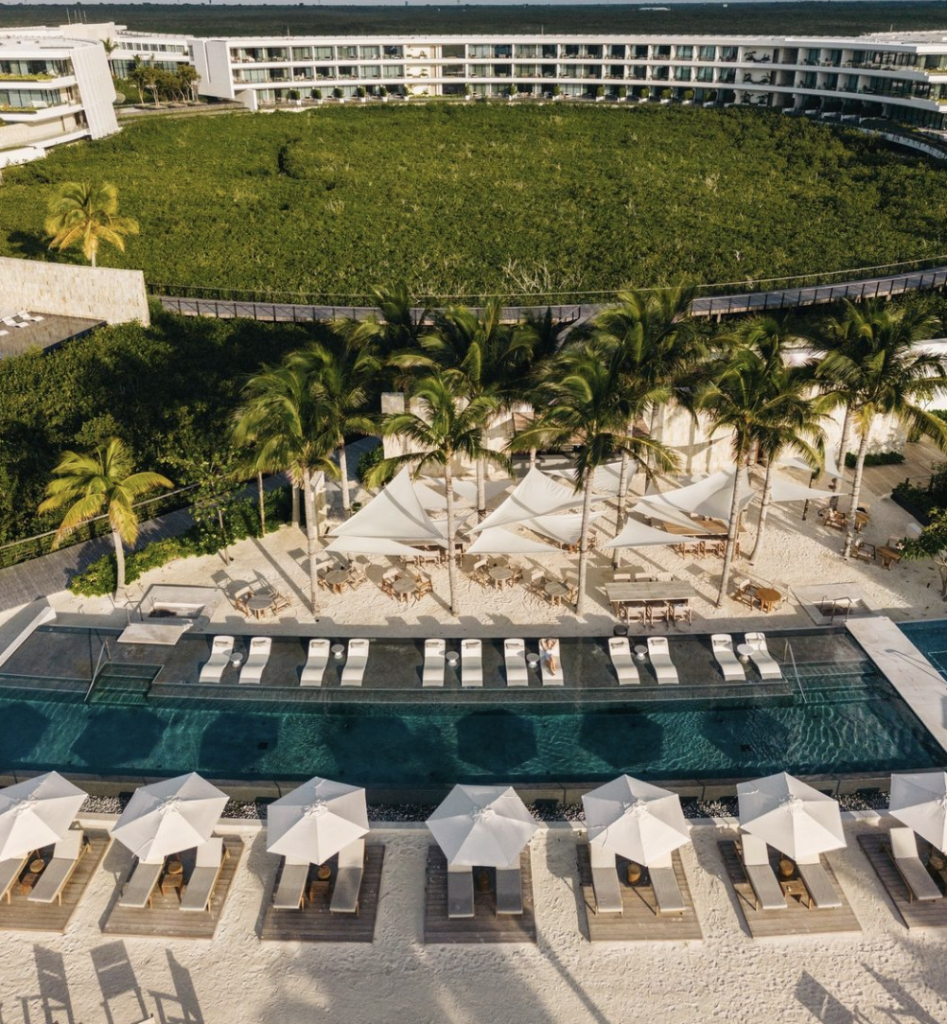Circular architecture of The St. Regis Kanai above the mangrove