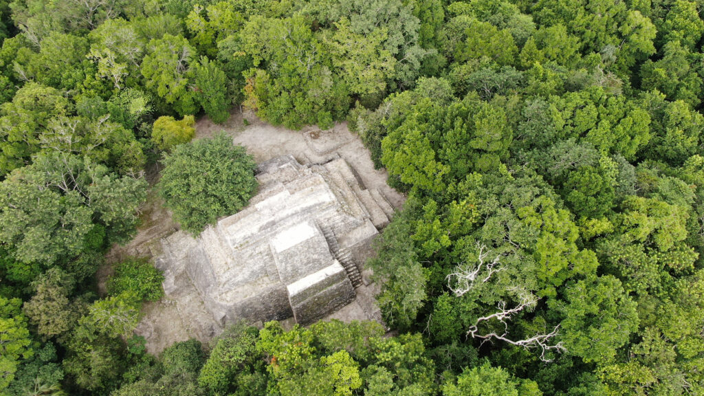Aerial view of the pyramids of Ichkabal above the jungle canopy