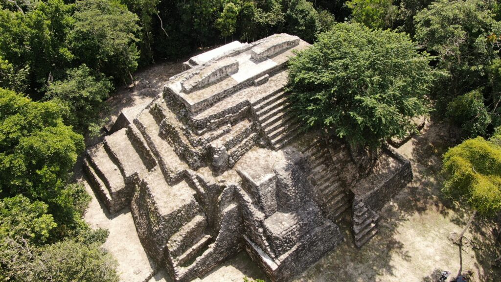 Aerial view of Ichkabal's pyramids surrounded by jungle